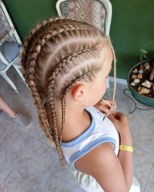 Intricate cornrow braiding