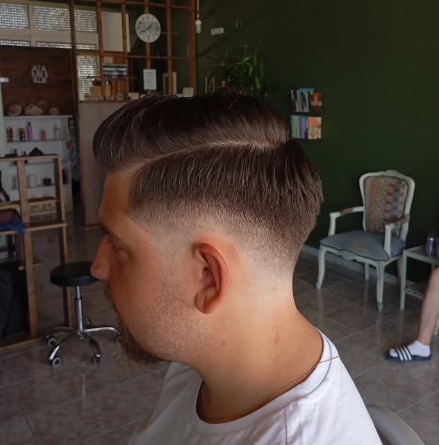 Classic men's taper fade finished by hand