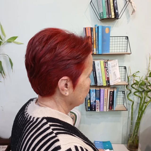 Vivid red short cut, styled to the side